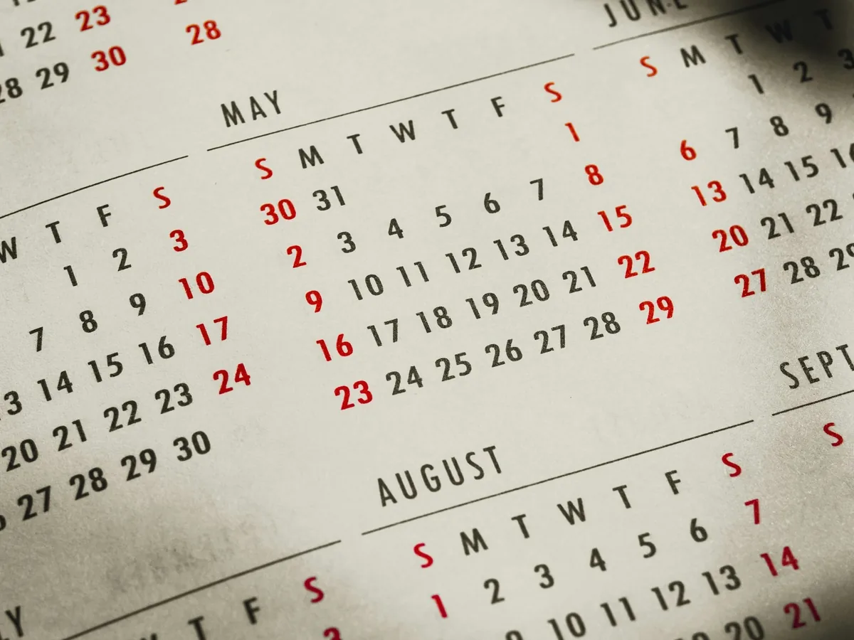 A year-at-a-glance calendar with weekends marked in red