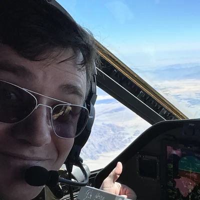 Dale (Joe) Bell in the cockpit of an aircraft in flight